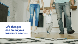 Couple holding baby's hands to help with walking