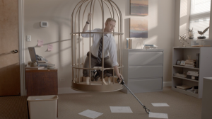 man stuck in cage