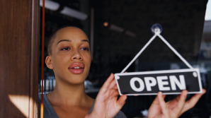Woman opening store